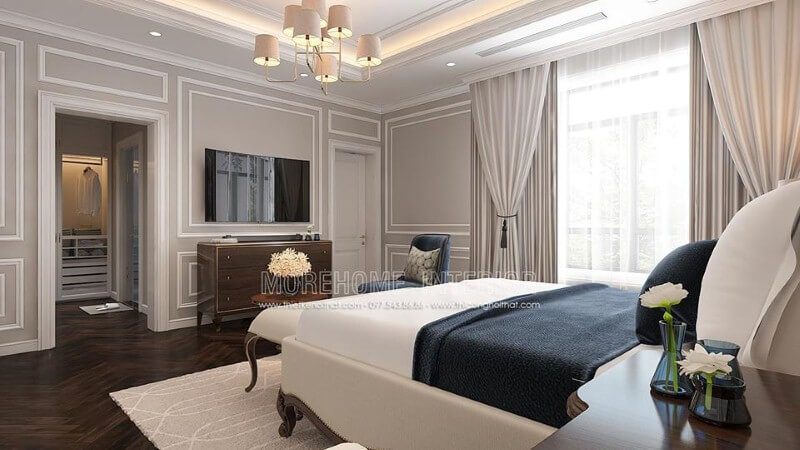 Bố trí nội thất phòng ngủ tân cổ điển có tủ quần áo đối diện giường ngủ khoa học, phong thủy.